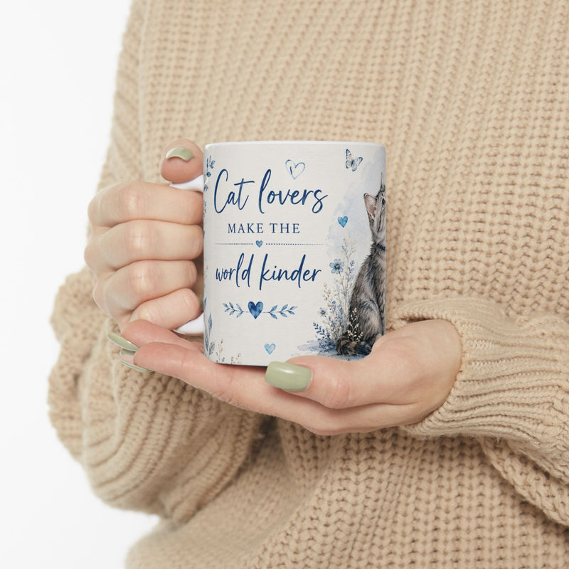 Cat Lovers Make the World Kinder mug lifestyle image